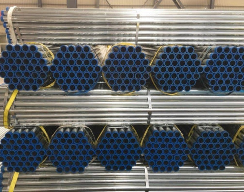 Jindal GI pipes showcased in a warehouse